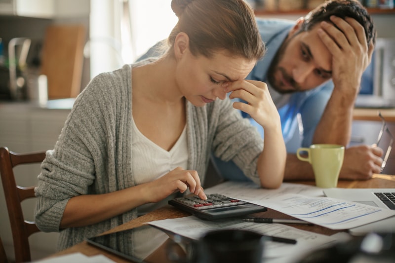 Stressed Couple Working On Budget Stressed Couple Working On Budget